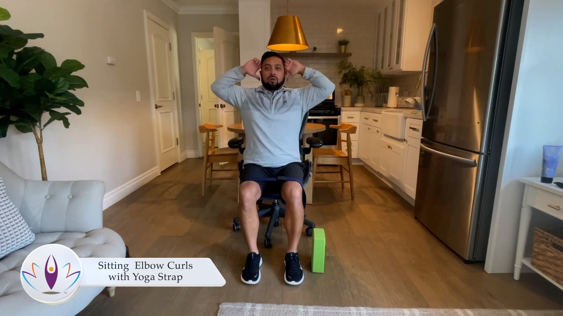Sitting Elbow Curls with Yoga Strap
