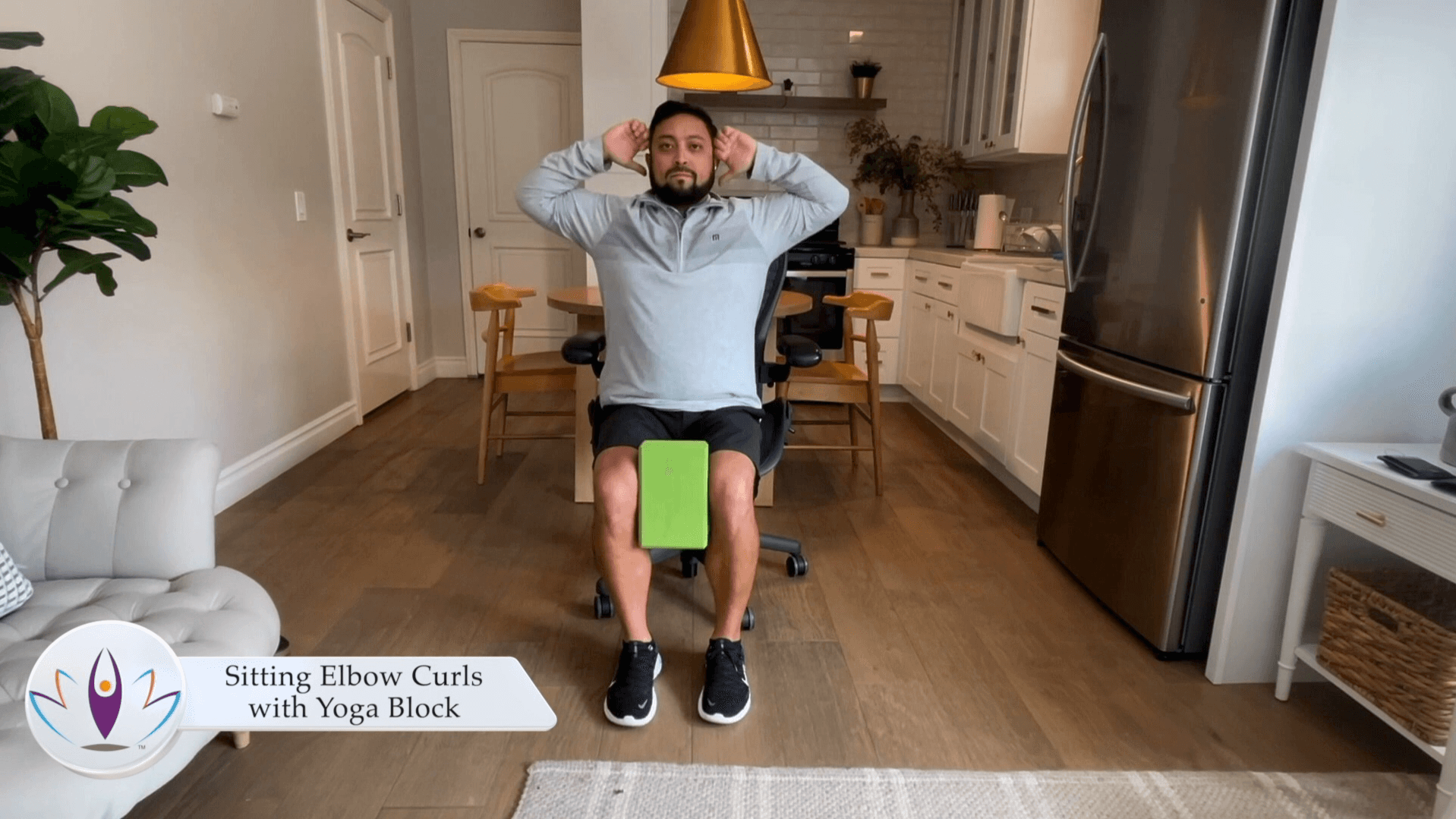 Sitting Elbow Curls with Yoga Block