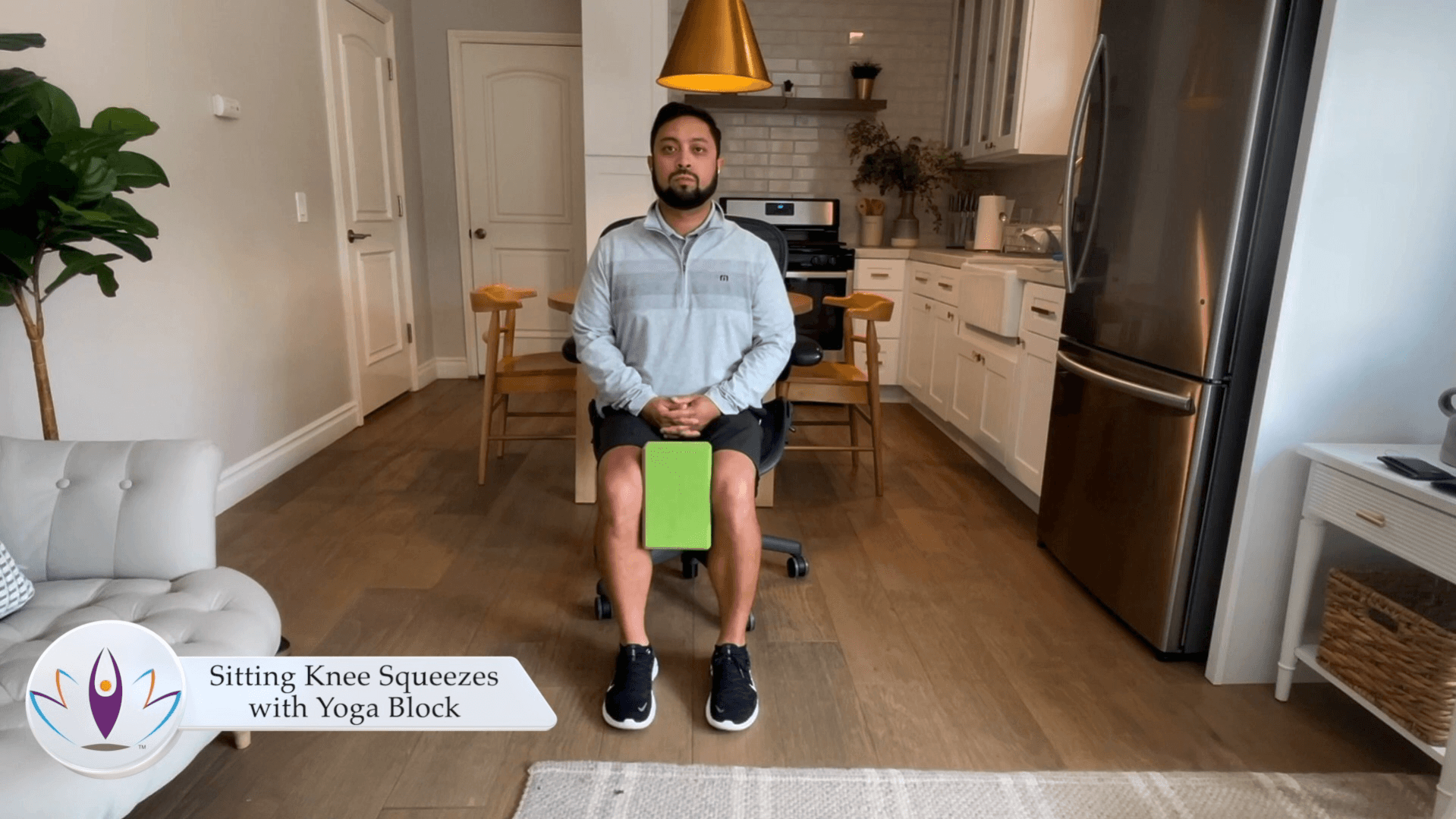 Sitting  Heel Raises with Yoga Block