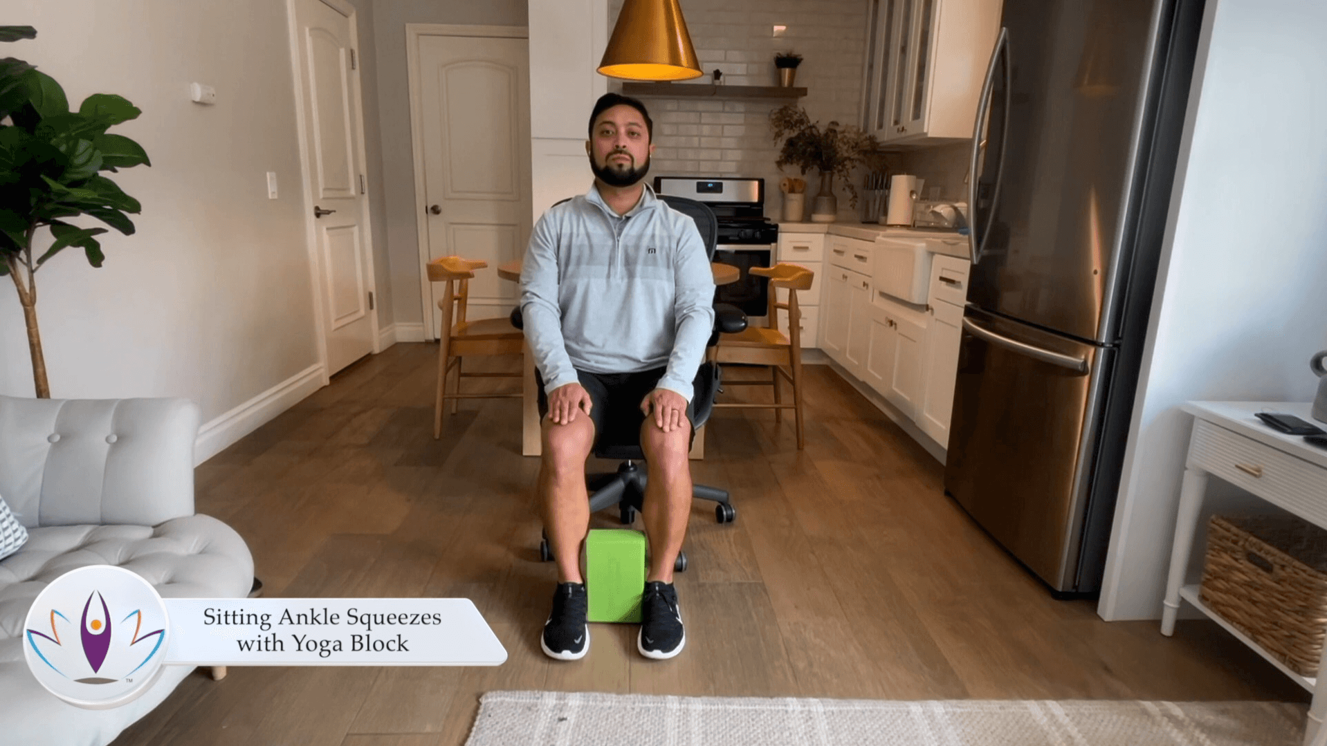 Sitting Ankle Squeezes with Yoga Block