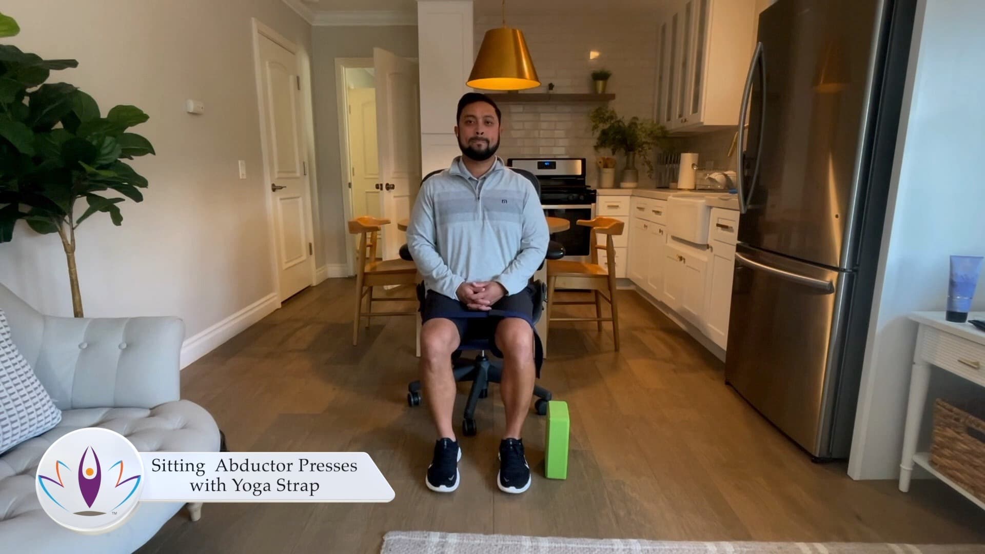 Sitting Abductor Presses with Yoga Strap